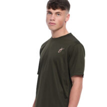 Male wearing green training top standing in front of a white background