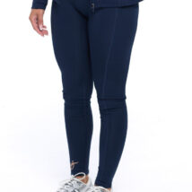 Female wearing Midnight navy leggings standing in front of a white background